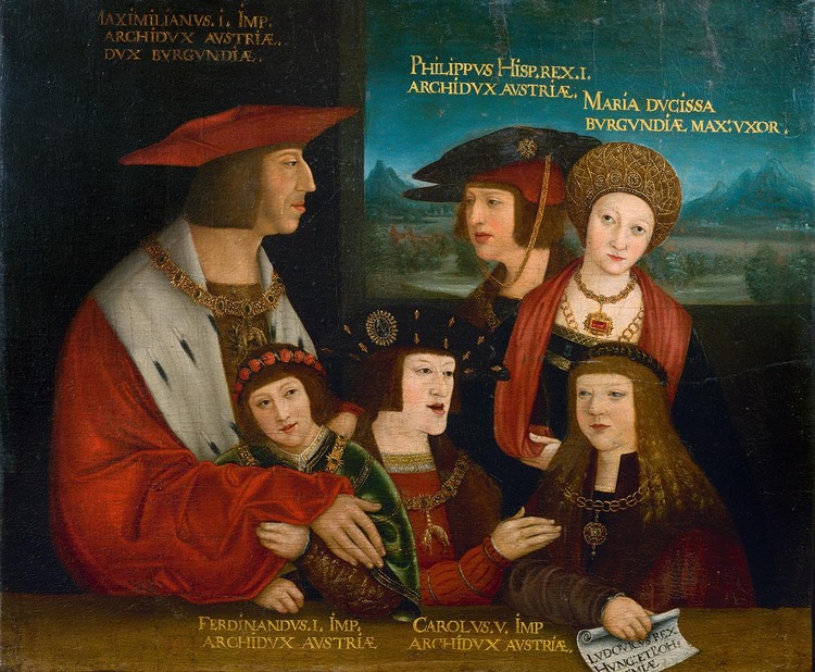 Een portret van een familie bestaande uit 6 personen in rijkelijk versierde kledij.